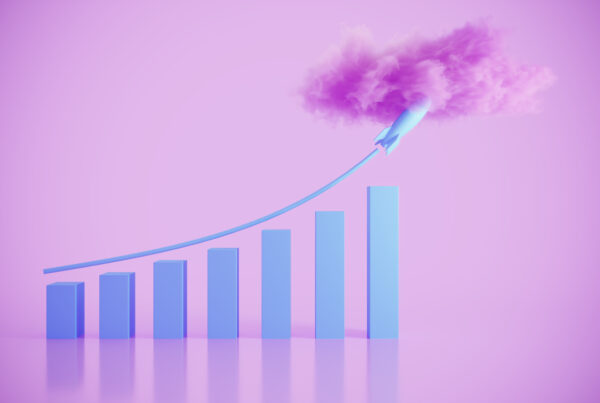 Financial growing graph with rising rocket to the cloud.